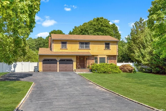 Welcome to this spacious bright, 4-bed, 4-bath Colonial located in Half Hollow Hills School District. This home boasts a large LR w/ bay windows, EIK w/ Cherrywood Cabinets, Granite countertops & Stainless Steel Appl. Formal DR, Family Rm w/ wood burning Fp/stove, sliding drs leading to a Sun Rm, deck, & patio. Hardwood flrs throughout & full Granite bathroom w/radiant floor heating complete the main level. The upper level consists of 4 generous size bedrooms including a Primary Bedrm w/ walk-in closet and En-Suite Marble Bathroom w/ a jacuzzi tub & radiant floor heating. The upstairs also features an additional full Marble bathroom w/ jacuzzi tub & radiant floor heating. Finished basement w/ entertainment room, laundry rm & full bath. 2 car gar w/ new garage drs, storage rm w/ access to the yard. New roof was added in the fall of 2021! All updated baths! CAC, 3-zone heating. Full fenced-in yard w/ over an acre of flat property w/ organic vegetable garden & room for a pool. Low taxes!