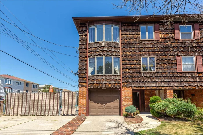 Welcome to the bright and sunny, corner lot, split level, two-family in the heart of Bay Terrace. This split-level style two family makes each unit feel like a house. the first level is a triplex style 4 bedrooms, 2.5 bath unit. The second level is a duplex style 3 bedroom, 2 bath unit. Each unit has its own yard and separate entrances. Attached is one car garage and a huge driveway large enough for 3 cars. Amazing location of North Bayside, close to Bay Terrace Shopping Center, Fort Totten Park, Bayside Marina, all highways, and public transportation.