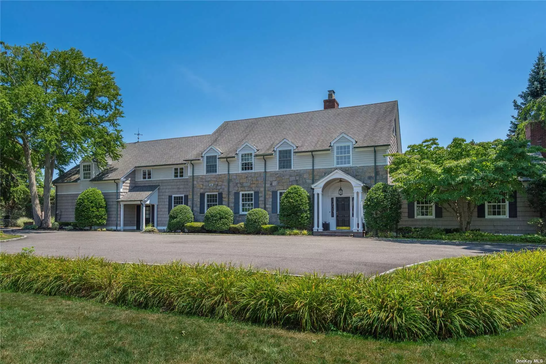 Spectacular, Sprawling Estate On 19.77 Acres, Adjoining Country Club. Pvt. Driveway W/ Beautiful Landscaping & Pond. 1st Fl Has Living Rm, Kitchen, Dining Rm, Powder Rm, Wood Paneled Library, Huge High Ceilings Family Rm. 2nd Fl Has Abundant Natural Light, 6 Br, 2 Mstr Suites/Walk-In Closets & Full Baths. Huge Backyard & Stone Patio W/ Ig Pool & Tennis Ct Is Perfect For Pvt Gatherings.