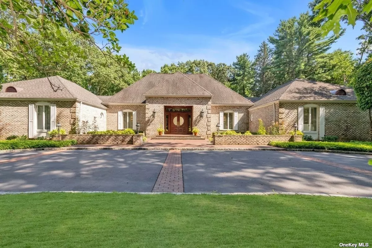 Oyster Bay Cove at it&rsquo;s finest! This Elegant & Exquisitely designed French Normandy inspired Ranch spared no expense on quality and design throughout! This Designer&rsquo;s residence has been created to provide the utmost in serenity, functionality and with the entertainers dream home in mind. Vaulted ceilings & walls of windows help create and bring the warm natural light into every room. Very inviting & impressive grand two-story entry foyer, open to the massive great room w/20&rsquo; ceilings & full natural stone wall w/fireplace and wet bar. Perfectly preserved wood floors throughout. Custom designed Wood Paneling in Library & Formal Banquet sized Dining Room leading to Spacious gourmet chef&rsquo;s kitchen with high ceilings and skylights overlooking Incredible Hampton-Like Backyard with gunite pool, stone waterfall, and hot tub. Octagon shaped Cabana with full bath, 2 changing rooms and wine cooler & more. Close to Shopping, train, Syosset Schools/Berry Hill Elem.