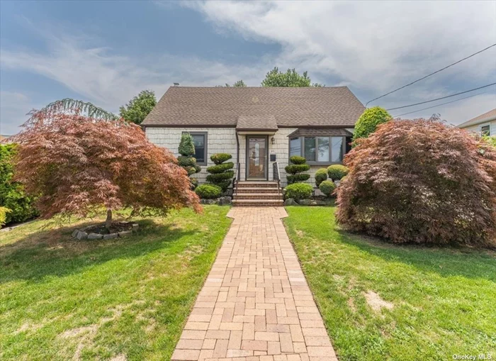 charming 4 bed 2 bath half Dormered cape with a finished basement on a oversized 10, 800 sqf lot with an above ground pool . nestled in the most desirable inwood country club area with a country like feel