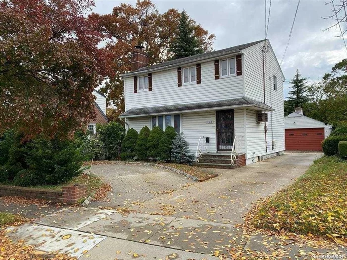 Spacious colonial with lots of potential. Priced to sell. Property is located near parkways, parks and shops.