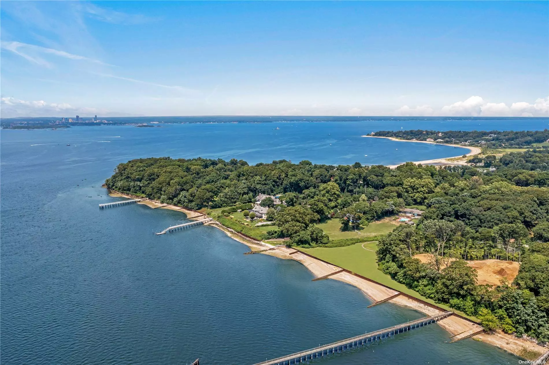 Build your Dream Home on this scenic, park-like property in Sands Point, spanning 2.3 acres with stunning water views.