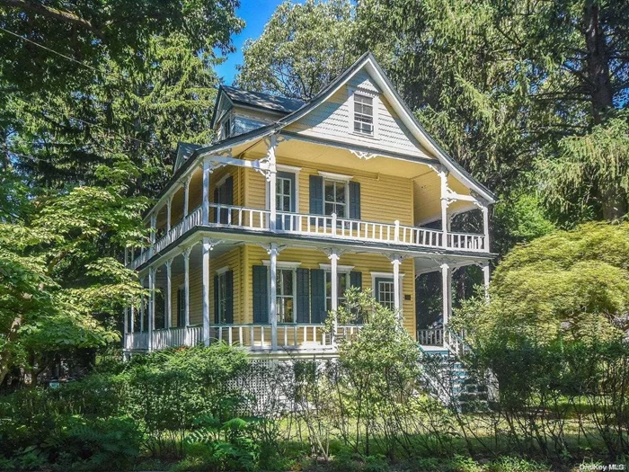 A Charleston Victorian with 2 levels of wrap around porches make this Sea Cliff Landmark 1886 National Register of homes so unique to the village. Use your imagination as to how you would want to live in this totally BOHEMIAN home!! There is a separate accessory structure that will be up to the new owner to work with the Village as to usage. This is a house that will need to be seen to discover all of its potential!! Become part of a vibrant village, enjoy beach rights and parks making you feel like you are on vacation all year round. Awarding winning North Shore schools.