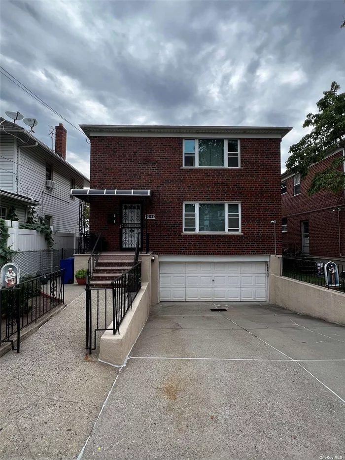 This Gorgeous Two Family Home is Move In Condition. Two Updated Eat In Kitchens and Bathrooms, Full Finished Basement Immaculate Two Car Garage. From New Tri-State Windows to Brick Pointing and Sealant,  French Drains This C-Block and Brick