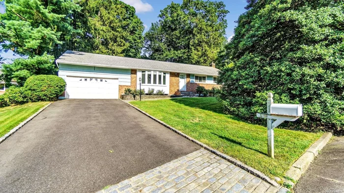 Mint condition, move-in ready, 3-bedroom Ranch home in the beautiful New Woods section of Glen Cove, NY. The sprawling first floor features updates throughout. Light and bright, with skylights in the kitchen and den. Full finished basement and attached garage. Walk out from your kitchen or dining room, to your well manicured yard featuring blue stone walkway and specimen trees. For those seeking highly desirable Ranch homes, this one not to be missed.