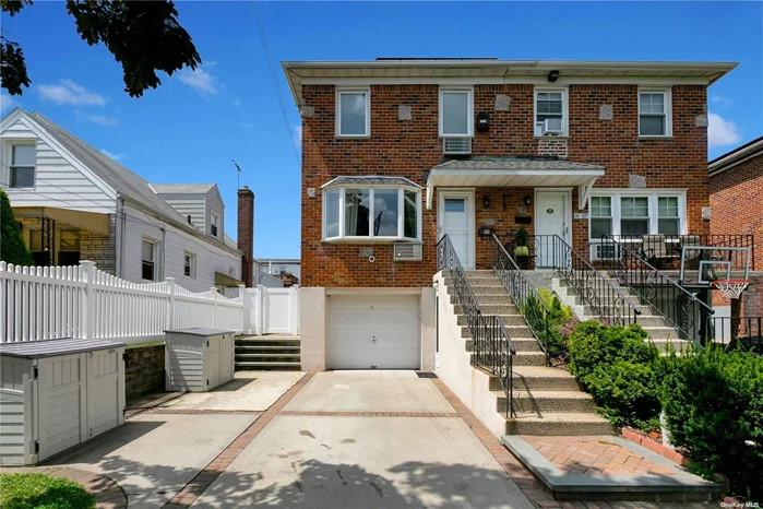 Beautiful Newly Renovated SD Brick Colonial for Sale in Bayside. Features 3 Bedrooms, 2.5 Bathrooms. Living Room and Formal Dining Room. New Gourmet Eat in Kitchen with Quartz Counter Tops and Stainless Appliances. Viking Oven/Range and Hood Fan. Kitchen also features Access to Deck with motorized awning. Hardwood Floors Throughout. Wall AC Units. Full Finished Basement with Laundry Room. New Roof with Solar Panels. Backyard with Cement and Paver Patio. Sprinkler System. 1 Car Garage and Private Driveway. Great Location Close to Stores, Q16 bus to Main Street, QM20 and QM32 express buses to Manhattan. All on 25x100 Lot!