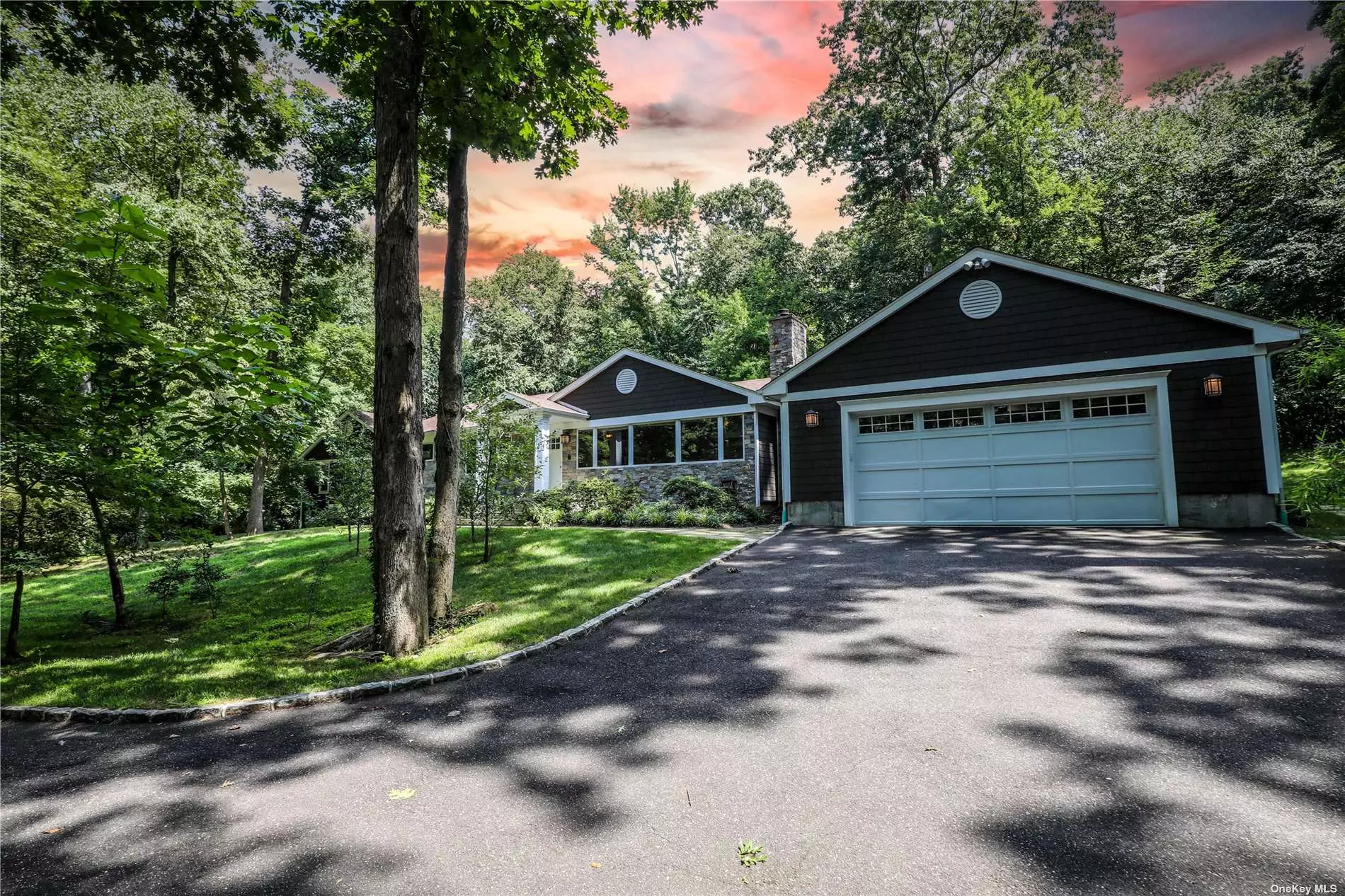 Welcome to this charming expanded ranch which offers a full finished basement with an outside entrance, plus four updated bathrooms and eat-in kitchen, +5 large bedrooms on the first floor and one bedroom in the lower level on two plush acres in the heart of Brookville.