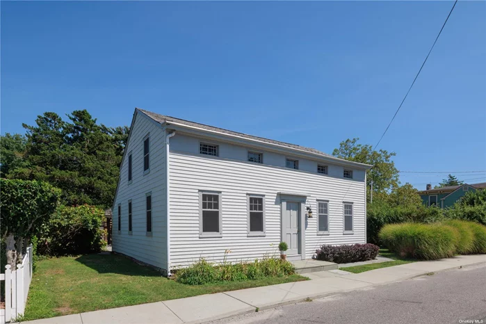 Iconic Greenport Village home located in a charming neighborhood just 100 yards from village shops and restaurants. This picturesque saltbox features 3 bedrooms, 2 full baths, open kitchen and living area with separate dining room and den. The spacious backyard includes a blue stone patio, outdoor dining pergola and room for further development. Take a dip in the Peconic at the end of Bay Ave every morning before you head into town for coffee and errands.