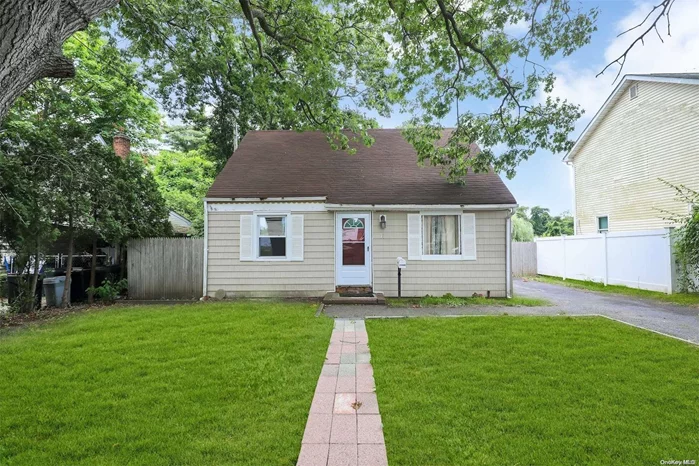 Priced to sell out of the gate! 4 Bedroom Cape offers Hardwood floors, Updated kitchen with new Back splash Nestled on tremendous lot that leads to a babbling brook. Needs a , little TLC. Won&rsquo;t Last!