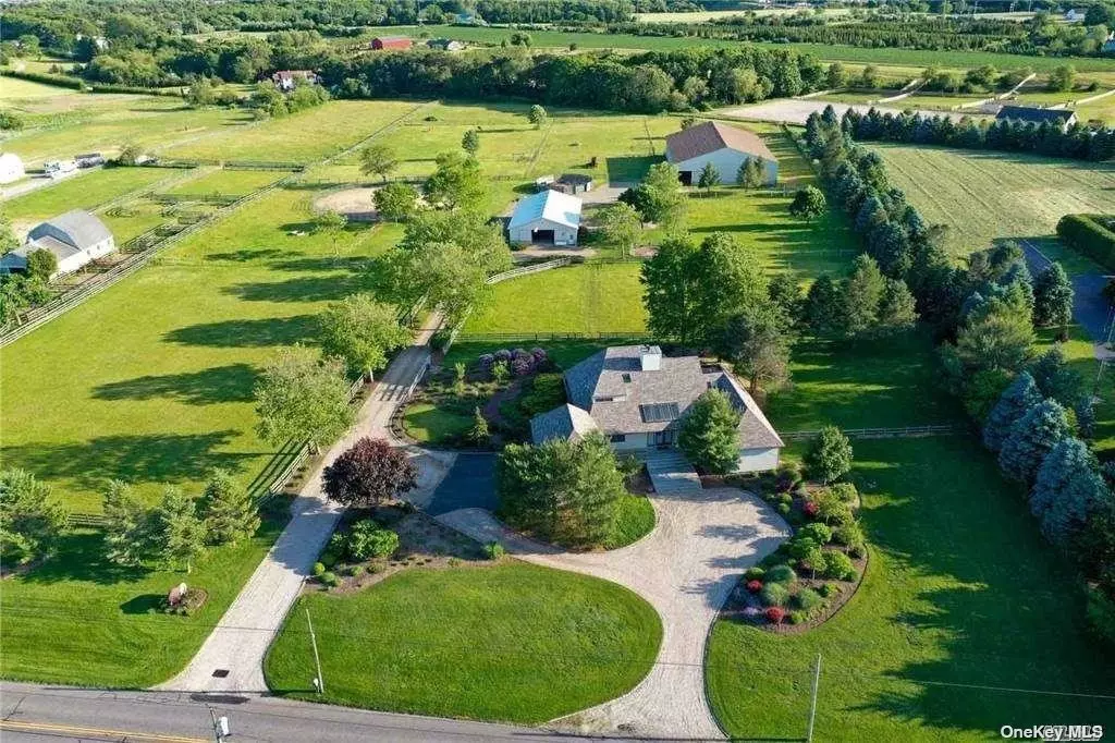 This spectacular residential horse farm was designed & constructed for family perfection, world-class showhorse maintenance, training & preparation. The gated private entry farm on 5+ acres has rolling, fenced & gated pastures & a southern exposure woodland line. Features a N/S Morton 42&rsquo; x 70&rsquo; Horse Barn, (6) 10&rsquo; x 12&rsquo; stalls w/ interior lightg, insulated roof & 12 rooftop skylights, tack rm & a 80x120 indoor riding arena!. The Hollenbeck designed, MAB Custom Built 4 Bedroom, 3.5 Bath, 4300+sq foot residence with 18&rsquo; high ceilings & Mexican Terra Cotta flooring features a Passive Solar, Open-concept Interior Living experience. There is a luxurious Master Suite with angled high ceilings perfectly sited with southern/western exposure for year-round comfort & glass sliders to the dual decks.The home also boasts a 4 car garage with 9&rsquo; height for the car enthusiast! Sit outside & enjoy the horses graze on green protected pastures! Additional 5 acres available for sale, Qualified Buyers only