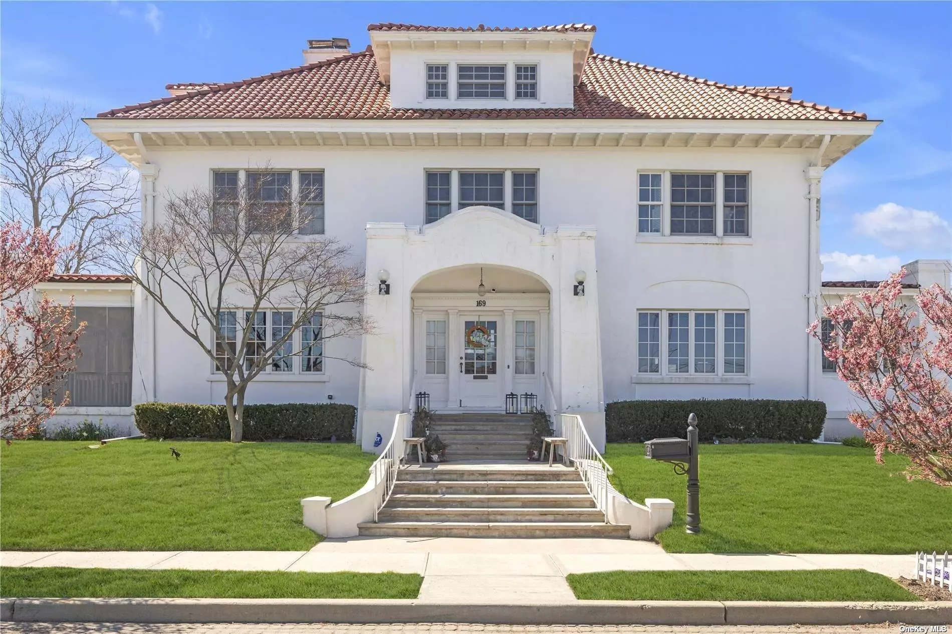 Meticulously restored historical home just steps from the beautiful ocean beaches on Long Island. This enchanting property has a luxuriously grand layout for entertaining, renovated w/ modern amenities for the best of both worlds. Enter the sumptuous foyer w/ its soaring ceilings & double spiral staircase. Spacious living room w/ wet bar leads into the sunroom. Cozy up in the formal dining room w/ wood burning fireplace. Gourmet kitchen filled w/ professional appliances: double sinks, 2 refrigerators, 2 ovens, gas stove, dishwasher & radiant heated floors. No home would be complete w/out an elegant butler&rsquo;s pantry w/ warming drawer. Ascend the spectacular staircase to your 4 bedrooms & 2 bespoke bathrooms w/ radiant heated floors & steam shower. On the top floor you have breathtaking views of the ocean & an open floorplan for home offices, playroom or additional bedrooms & bath. A fully finished basement w/ separate entrance & full bath awaits your return from the beach/boardwalk.
