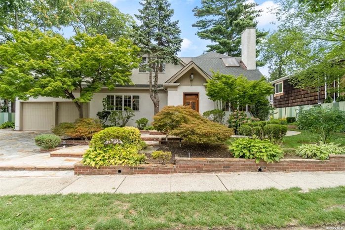 Stunning colonial, a hidden gem, rebuilt in 1990 with a vision of creating warmth and elegance. The stately entry showcases style facade. Impeccable custom details throughout this 5 bedroom, 3.5 bath home located in the heart of Great Neck. Brilliant sun-drenched rooms adorned by custom skylights, hardwood floors, and architectural staircase which creates dramatic elegance. The second floor hallway features an Arch detail with high ceilings; double closets and skylights in each room. The state of art chef&rsquo;s kitchen w/premium stainless-stee appliances, marble countertops and island with a breakfast room drenched in natural light from the skylight and custom windows. The formal dining rm, living rm, spectacular great room w/fireplace opens to an imported stone patio, built-in BBQ w/gas. updated roof (2021). Lush foliage and flower gardens are highlighted with a Japanese pagoda and Koi Pond. Perfect for outdoor entertainment or a place to kick off your shoes and totally relax.