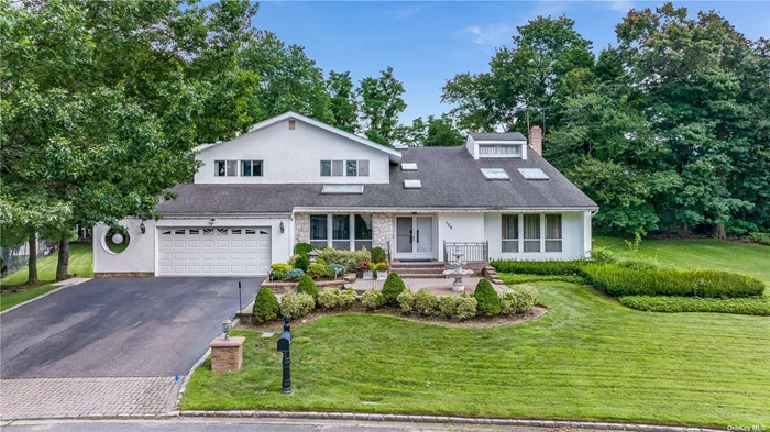 The House You Have been Waiting For. Expanded Contemporary Colonial in Muttontown Knolls! This Bright & Spacious Multi Generational Floor plan is Perfect for Entertaining. Features 5 Bedrooms, 5.5 Baths & Full Finished Walk Out Basement w/8ft Ceiling. House Boosts Expansive Entertainment Rooms, 8 Skylights, Huge Eat-in- Kitchen w/Island, Butler&rsquo;s Pantry w/WetBar, Main Lvl Expanded En-Suite Master Bedroom Perfect For Parents. Second Floor Features Spacious Mater Bedroom w/Spa Bath, Dressing Area, 2 Walk In Closets & Balcony Overlooking the Backyard. Cathedral Ceiling in All Upstairs Bedrooms, Family Rm Flows into a Beautiful Bonus Sunroom that Open Up to Parklike Serene Backyard w/Waterfall, Patio, New Trex Deck & Gazebo That Makes It Perfect for Hosting Friends & Family. Syosset Schools, Close To All. Priced to Sell.