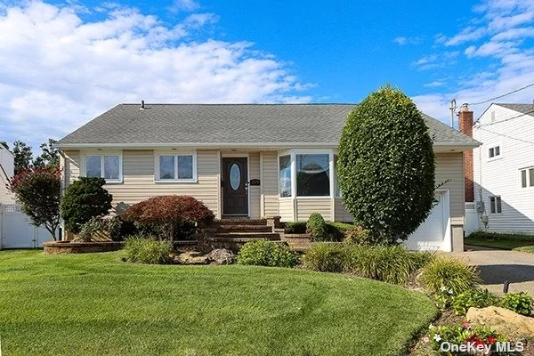 Come see this beautiful 4 bedroom/ 3 bathroom Split located in The Mandalay section of Wantagh. This home features a Living Rm with 13 ft vaulted ceilings, beautiful eat-in kitchen with plenty of countertop space & SS appliances. If you take a few steps up you will find a newly renovated bathroom and four bedrooms. Oversized master suite with cathedral ceilings, walk in closet, office, Full bath with jacuzzi tub and shower. Large family Rm which includes an updated bathroom, laundry room with lots of cabinet space, and a toy room. Family Rm leads out to a huge partially covered concrete patio and an in ground salt water pool. Pool liner and pool cover are both new. Backyard contains a direct line to gas, perfect for a BBQ.This house has plenty of storage space (numerous closets, an attic, 3ft crawl space). In-ground sprinklers 2 central air units. HW heater is less than 6 months old. Despite being less than a block from the water, this house had no Sandy damage. No flood insurance req