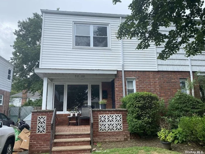 Beautiful 3 bedrooms, 1.5 bathrooms semi attached house with updated kitchen, granite countertops, stainless steel appliances, hardwood floors, central air, washer, dryer, backyard, front and back porch, parking for 3 cars on the driveway. Close to public transportation. Must See!