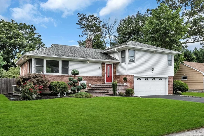 Move right into this beautiful fully updated brick split on 80x125 flat property in Flower section of North Syosset. South Facing w/ Lots of Natural Light. This Turnkey Split-Level home features 3 bedrooms and 2.5 baths. Upon entering, You are welcomed by the bright and airy living room, formal dining room, and kitchen overlooking the spectacular rear yard with A back doors opening to a spacious Patio. Hard wood flooring & Anderson windows throughout. Family Rm W/Entertainment Area or Office Space with New half bathroom and new flooring. Central Air, Tankless Gas Heat & Cooking; 2 car garage with an oversized driveway that provides plenty of private parking! New Wifi Sprinker system. Updated 200 Amps Electric. Berry Hill Elementary/Syosset Schools!