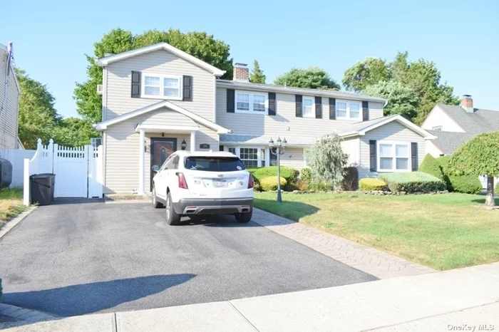 There&rsquo;s Plenty Of Room To Roam In This Gorgeous Colonial Style Showplace That Only Need Some New Owners ! In Front We Have Picture Perfect Curb Appeal, Professionally Landscaped With Inground Sprinklers Along With Beautiful Stone Pavers ! The Back Yard Is Fully Fenced With Mostly Stone Pavers & Covered Patio . When You Come Inside We Have A Cabinet Lined Eat In Kitchen With Granite Counters With Updated Appliances, Spacious Living/Dining Room Combination, Den Or Family Room With Stone Fireplace, Seperate Utility Room Along With 2 Full Baths ! Upstairs We Have 4 Family Sized Bedrooms, Full Bathroom, Seperate Laundry Area Along With Additional Storage ! Interchangeable Interior Layout With Endless Possiblities ! It&rsquo;s What You Looking For Both Outside & Inside ! Come See This Showstopper Of A Home & Your Search Will Be Over !