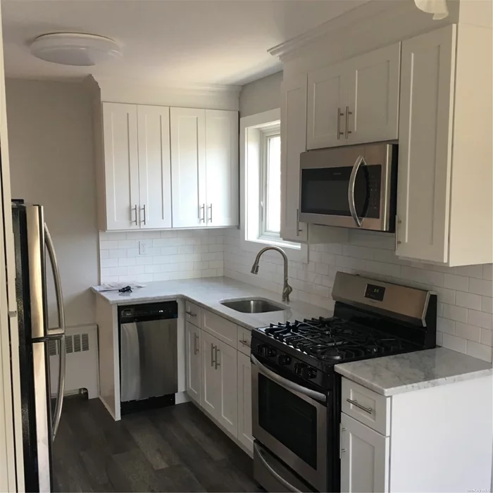 Renovated apartment on second floor. Living room, dining room, 3 bedrooms and 1 bathroom. Hardwood floors. A/C units, dishwasher. Street parking, no laundry. Small dog or cat allowed. Heat included.