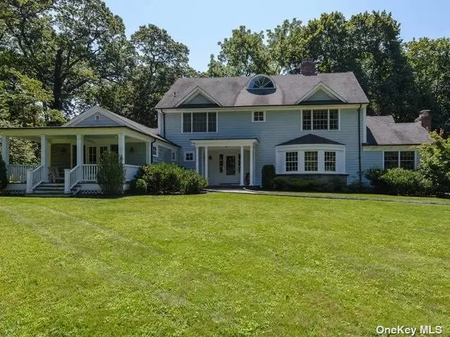 Tucked Away Gem Near Town of Oyster Bay. Expanded and Updated, this 5 Bedroom Colonial Offers Every Amenity Including Front and Back Stairs, Whole House Generator And 3-Car Carriage House with Full Basement and Attic. The 2.74 Acre Setting is Private and Tranquil with Lush Lawns Bordered By Mature Trees.