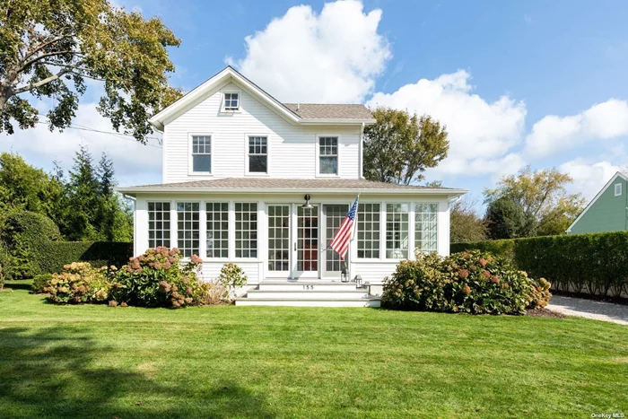 A beautifully landscaped property provides the perfect setting for the quintessential, authentic North Fork farmhouse. Thoughtfully renovated to create a seamless blend of contemporary style and North Fork charm. The enclosed porch is flooded with natural light, setting the tone for a home that marries beauty and function. Three bedrooms, two baths, ample room for a pool, less than a half mile from Founders Landing and Southold restaurants and shops. Perfectly designed for indoor/outdoor entertaining. Strong rental history.