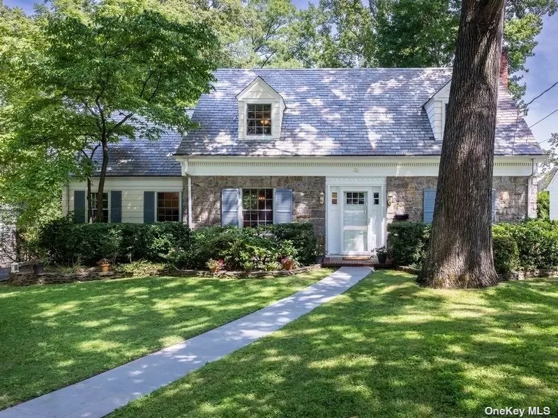 This Walter Uhl Colonial is nestled on one of the quietest streets in Manhasset Bay Estates. Filled with light and architectural charm, this home features 4 bedrooms and 2.5 baths. A beautifully, updated kitchen overlooks the tranquil, oversized and private yard as does the charming screened porch. It offers a perfect balance of historic house details and modern amenities. Located a short distance from Merriman (Pine Street) Park, town, the Port Washington station of the LIRR, this home offers the ease and convenience one associates with living in the picturesque area known as Manhasset Bay Estates.  It is truly special - offering one of the largest properties in the area - ideal for the buyer who wants extra privacy and land and still be close to it all! Property includes 3 lots and totals approximately 1/3 of an acre. - see survey attached. PLEASE NOTE: SELLER REQUIRES MASKS FOR ALL SHOWINGS.