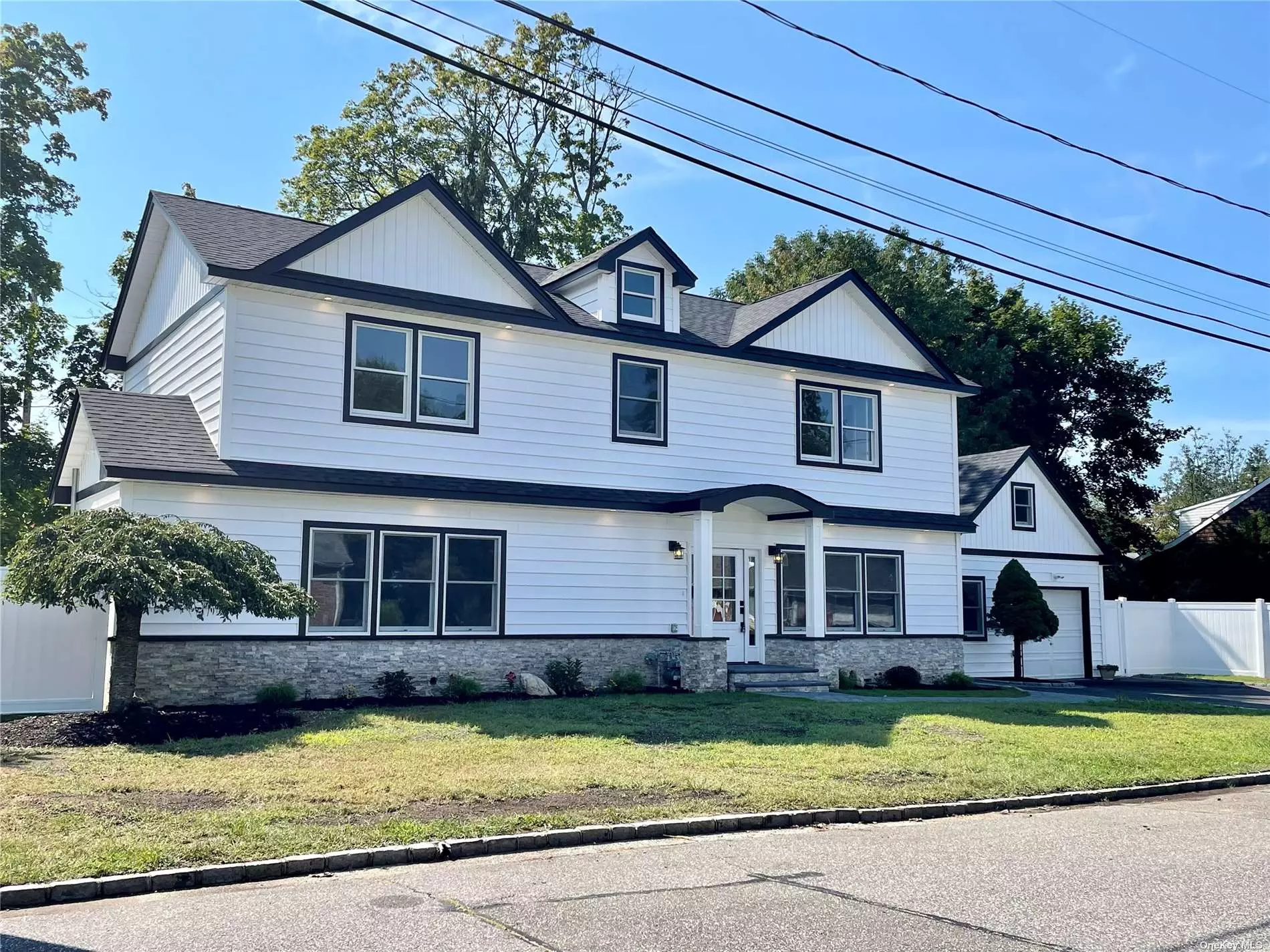 Fabulous Completely Renovated Colonial Situated on a Lovely Cul-de-sac in North Syosset. The Entry Offers Clear Site Lines to The Ultimate Chef&rsquo;s Kitchen with Quartz Countertops and Large Oversize Island. The Great Room Living is Perfect for Today&rsquo;s Easy Lifestyle Living. Perfect Primary Suite with Spa Bath and Two Walk-Ins Closets Located on the Main Floor. The Gleaming Hardwood Floors, Custom Millwork and High-End Finishes add to this Wonderful Property.  Syosset SD#2