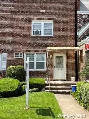 Beautifully maintained Brick home located in the heart of Whitestone. Living Room, dinette and kitchen on the first floor. Second floor has 2 bedrooms and full bath. Hardwood floors throughout. Fully finished basement with separate laundry room, boiler room, play room and full bath. Outside entrance  Close to all -- Parking for 3 cars in the back. MUST BE SEEN       R3-1 Zoning