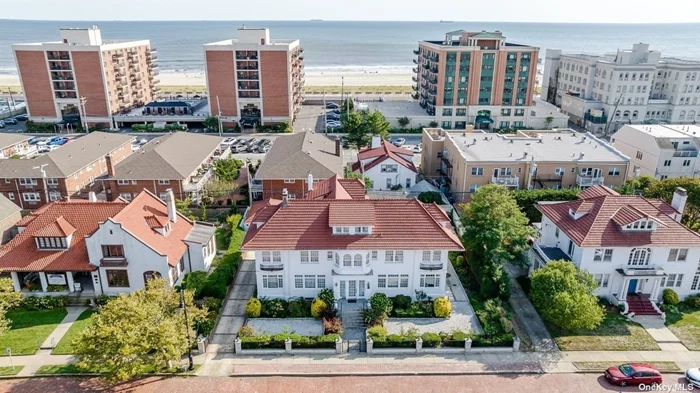 Motivated Seller! Welcome To One Of Long Beach&rsquo;s Elegant Historic Mini Mansions! This Rare Priced to Sell 1915 Home Is Situated on a Sprawling 100x100 Lot In The Historic Red Brick District. This 11 Bedroom (3 Ensuite) & 4.5 Bathroom Home Maintains Old World Charm With Ocean Views. At First Glance, you will be Awed by the Magnificent Exterior and Meticulously Landscaped Gardens. Features: Extravagant Foyer, Over-sized Formal Living Rm w/Decorative Fireplace, Gatsby Style Bar, Elegant Formal Dining Room, Library/Study, Powder Room, Eat-In Kitchen w/Breakfast Nook. 2nd Floor Features Primary Bedroom Ensuite w/Sunlit Ocean View Sitting Room & Dressing Room, 3 Bedrooms (2 Ensuite), Sitting Room. 3rd Floor: 6 Bedrooms & Full Bath. Expansive Paved Yard, 1.5 Car Garage and Gated Multi-Car Driveway. Minutes from Pristine Beaches, Long Beach&rsquo;s Famous Boardwalk and Less Than One Hour From Manhattan. Coastal Living at it&rsquo;s Finest!