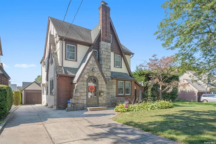 Location! Location! Location ! One of a kind oversized 80x100 Lot, can be subdivided. Charming Det English Tudor w/Brk/Flds Front on quiet tree-lined street features 4-5 Bdrm, 1.5 Bath, LR w/ FPL, FDR, Large E-I-K with sub-zero Refrigerator, Sunroom, Sliding Doors to Backyard. Convenient to all shopping, transportation, houses of worship. Must see. Don&rsquo;t miss this beauty!