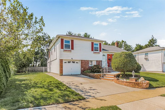 Welcome To This Well Maintained Expanded Split Level In The Desirable South Grove Section of Syosset. It Featured 4 Bedrooms And 2 Full Baths With A Spacious Family Room In The Rear Of The House. Interior Space Is 1962 Sqft . Low Re-Tax At $15829.(Additional Star Exemption $1425 If Qualified) The 1st Floor Comes With Open Concept Lr, Dr & Eik With Stainless Steel Appliances, Granite Countertops & Customized Cherry wood Cabinets. 2nd Floor Features 3 Bdrms And 1 Full Bath. Lots Of Storage Space. Level Floor Comes With 1 Bdrm And 1 Full Bath. Wide&Open Den In The Rear Can Be Used As A 2nd Living Room For A Large Family. Full Finished Basement Has Tons Of Storage Space. Recreational Area For Entertainment Purpose. Hardwood Floor Throughout The Whole House. One Car Garage Attached. Prime Location! Close To Shopping Area, Minutes Away To I495& Grand Central Are Nearby. LIRR To Manhattan. Top Syosset SD! South Grove Elementary is Steps Away. Priced To Sell!!