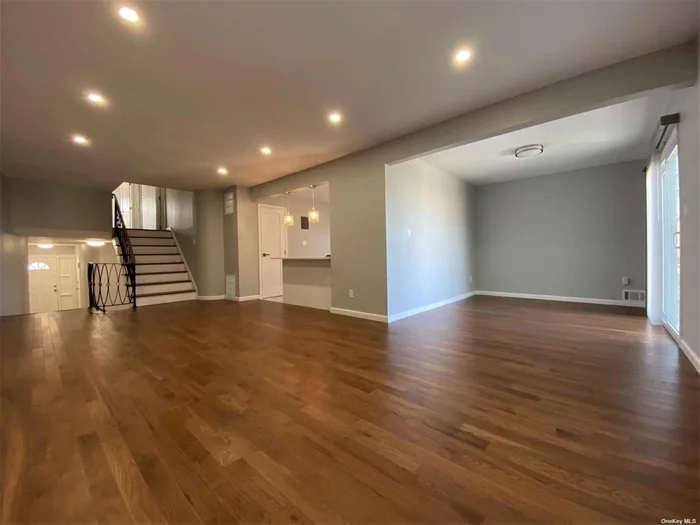 Newly constructed. 1st Floor duplex apartment with: 4 bedrooms, 2 bathrooms, and 1 garage with 1 parking space. Includes 2 balconies. Brand new washer, dryer, refrigerator, stove and central air conditioning. Near Bay Terrace Shopping Center, accessible by the Q13 Bus Station and LIRR.