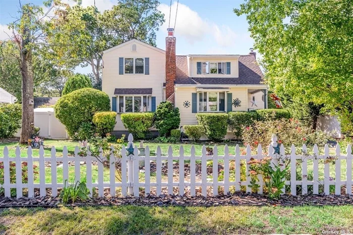 You Spent Your Summer Looking At The Rest. Now Fall Is Here Come And See The Best! Charm, Character, Sunlight and Space Can Be Yours! Rock Gardens, Waterfall, Fish Pond, Privacy and a White Picket Fence Truly Make This Charming West Islip Center Hall Colonial A Perfect Home Sweet Home!