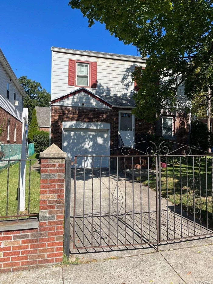 Sun soaked 3 Bedroom Brick colonial on 50 x 93 beautifuly manicured property. Corner lot completed fenced in. Close to all transportation, schools and shopping.