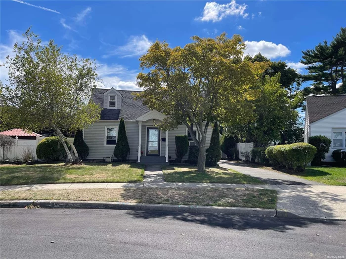 Welcome Home To This Cape Cod Style Home In The Heart Of Bethpage. Featuring Wood Floors Through Out The First Floor And An Updated Kitchen With All Stainless Steel Appliances. Sliding Door Leads To A Beautiful Large Trex Deck with PVC Railings and a Very Large Yard., Additional information: Appearance:As Is, Separate Hotwater Heater:1