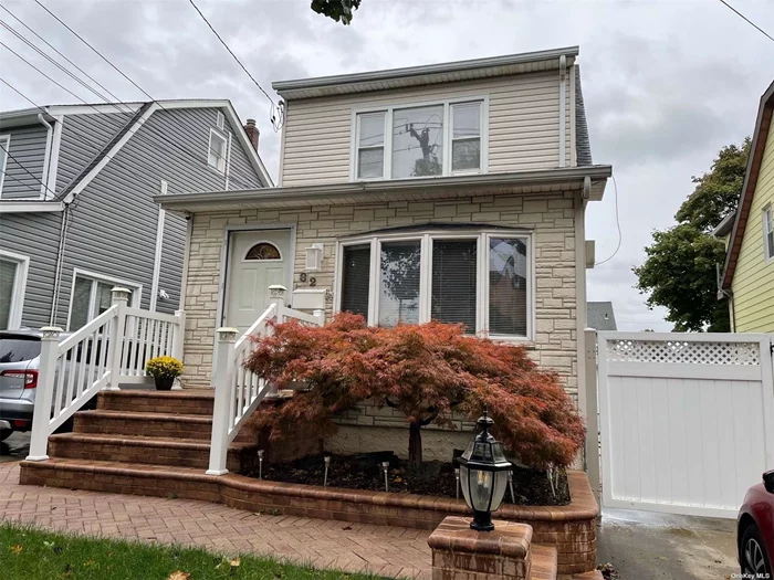 Oversized Colonial with a Formal Dining Room or 4th Bedroom on the first floor. An Eat-in-Kitchen with Granite Counter Tops. Tile Floors with Updated Kitchen and Baths.