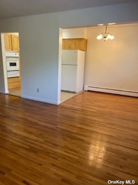LARGE TWO BEDROOM APARTMENT IN THE HEART OF BAYSIDE! This Spacious Sun Drenched Apartment is located just two blocks to LIRR!! A 3rd floor unit walk up - this unit is in Diamond Condition! Large Living , Formal Dining Room, A great updated Eat-In Kitchen with tons of Sunlight and Closet Space! Two Large Bedrooms with Large Closet Space, and Nicely Updated Bathroom! Heat and Hot Water Included with Parking Spot in Front!