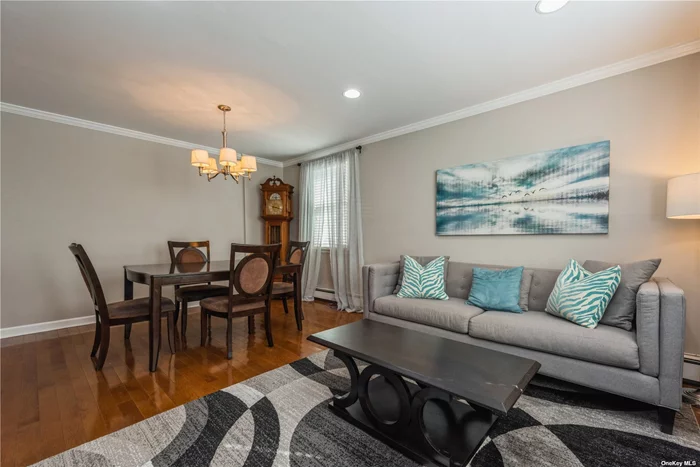This fully renovated unit features a large LR, FDR, recently remodeled bathrooms, 2 large bedrooms, ample closets, a galley kitchen with wood cabinets, and a great terrace. The building has indoor garage parking, an in-ground pool, an elevator, storage for each unit, private party room rental, and ground-floor laundry.