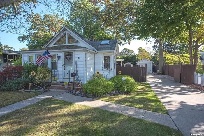 Loaded with charm & charisma. Ranch features light & airy skylit open concept, with nice sized living room w/vaulted ceilings, dining area, kitchen, master bedroom, bedroom, full bath, basement & garage. Deck, CAC, 200 amp electric, architectural roof, replacement windows.