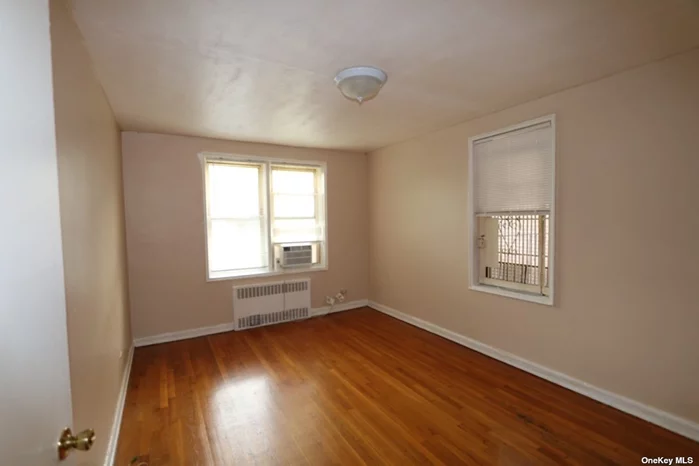 Welcome to this pleasant, freshly painted 1 bedroom apartment for rent! Offering windowed bathroom and kitchen with new appliances, and hardwood floors throughout. Unit also features bright and spacious rooms. Conveniently located in the well-maintained Winston Apartments Building! Close to schools, shopping, restaurants, MTA-transportation, and express E/F trains.