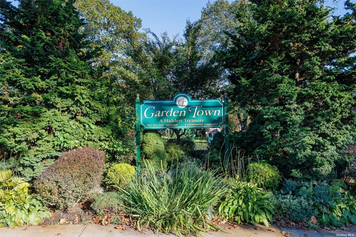 Beautiful Garden Town Apt on the 2nd Floor. Updated 2 Bedrooms & 2 Full Baths. One Full Bath in Master Bedroom. Hardwood Floors Throughout Hallway- Living Room-Dining & Kitchen. Beautiful Crown Molding in Every Room. Miraculously There is A Pull Down Ladder for Good Attic Storage. Terrace Overlooks Expanse of the Development; Nice View. Comes with 1 Parking Spot in Garage. Washer/Dryer in Unit. Apt is Very Close to the Municiple Lot for Free Unlimited Parking. Big Bonus. Very Well Maintained Grounds. Must See!