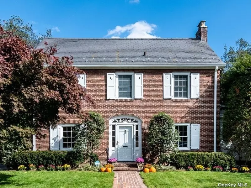 Located on a quiet street in the heart of Munsey Park, this traditional brick Colonial feels like home from the moment one arrives. Upon entering, you will enjoy a spacious foyer with immediate access to grand living and dining rooms with abundant light and extensive millwork. In addition, an updated eat-in-kitchen with vaulted ceilings and custom cabinetry including, farm sink, instant hot pot filler and subzero beverage drawers, den with vaulted ceiling and powder room complete the first floor. There are 3 bedrooms and full bath with separate tub and shower on the second floor. Third floor walk-up is bonus space. With a 2-car detached garage and full basement, there is plenty of room for storage of life&rsquo;s necessities. Enjoy easy access to schools, parks, train, town and Americana Shopping Center. Low taxes. Equipped with Tesla home charger!