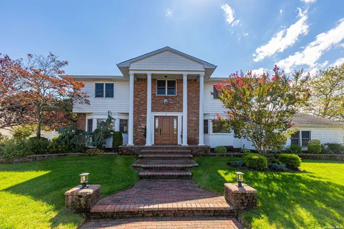 Sprawling Georgian Colonial located in Bar Harbor! This home has a bright and sunny corner location and contains 4 total bedrooms, 2 full baths and 2 half baths. The first floor features an open layout with updated granite kitchen, formal living room, family room with wood-burning fireplace, formal dining room and laundry room. The primary bedroom features a stunning en-suite granite bathroom with tub and standing glass shower plus WIC. The backyard is fully fenced and ideal for entertaining with in-ground pool and retractable awning over the deck. Recent updates include brand new flooring and doors, bathroom renovations, new CAC unit, pool liner and electrical updates. Full basement, attic and attached two-car garage complete this home. Taxes w. STAR $22, 006.