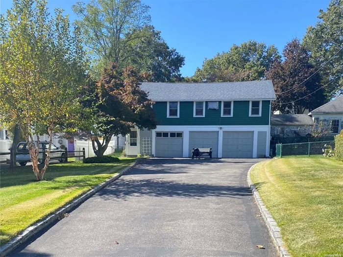 Sundrenched 2 bedroom second floor cottage centrally located. Set back from street, with driveway and yard included. Charm throughout. Newly done wood floors. Updated bathroom, newly painted, lots of windows, large laundry room with new washer & dryer. A perfect and private spot!