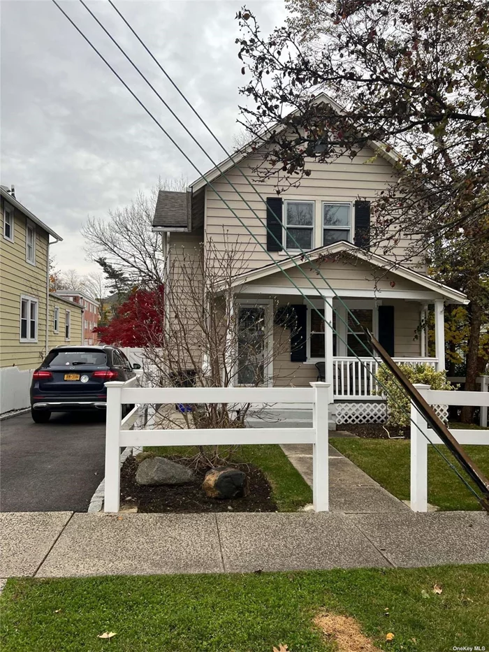 Ideally located near schools, shopping and LIRR. This newly renovated Colonial has 4 bedrooms, 2 full bathrooms, beautiful EIK, living room, private fenced in yard with deck and lovely front porch. Full finished basement with bonus room. Available immediately.