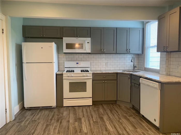 Charming 2 Bedroom 1 Bath Rental located in the village of Oyster Bay. Updated Kitchen with Granite countertops, living room dining room with hardwood floors Mud room with washer and Dryer and Updated bath. Conveniently located near shopping, restaurants, parks and beaches.