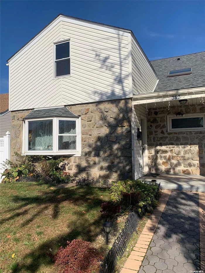 SHARED USE OF BACK YARD! A Beautiful, Spacious, Newly renovated, 4 Bedroom, 2 full bath apartment! Easy street parking! Close to the N15 Bus Line, LIRR & East School, Shops, Beach & 2.1 Mile Boardwalk!!!! Eat in Kitchen. Use of Full Attic! Large Bedrooms & Baths! Washer & Dryer. . Pets Considered.