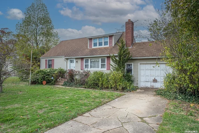 Spacious Cape Cod in The Village. FULL Unfinished Basement with interior access through the attached garage. Updated Boiler and Hot Water Heater. Opportunity Knocks in Every Inch of This Home.