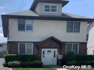 Located in a residential neighborhood. Just painted, new hardwood flooring through out. So close to everything! 4 Family apartments 2 on first 2 on second