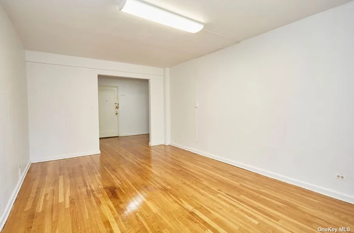 Spacious and affordable one bedroom on a quiet block in Briarwood. Every room has windows, large eat in kitchen, newly finished hardwood floors and plenty of closet spaces. Extremely low maintenance, sublet allowed after 1 year, laundry room on lobby level, parking on a wait list. Steps to E & F train, close to library and shops. Great Potential!